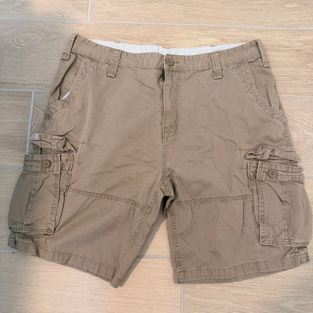 Tan cargo shorts with button waist and pockets